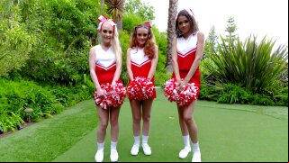 Three spunky cheerleaders servicing rock hard cock outdoors